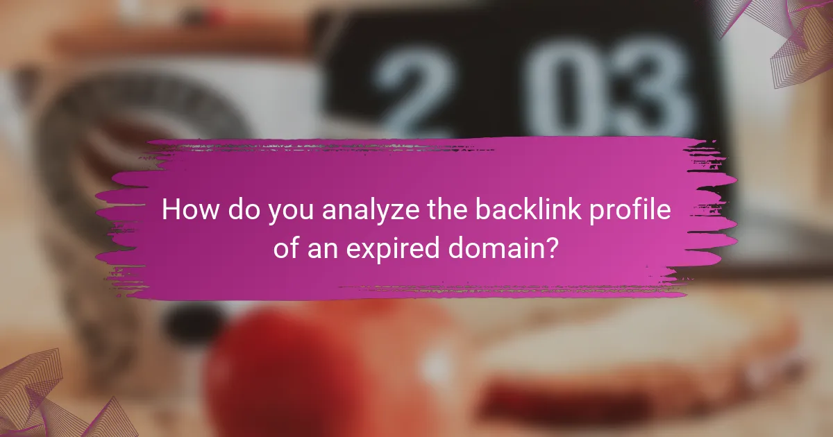 How do you analyze the backlink profile of an expired domain?